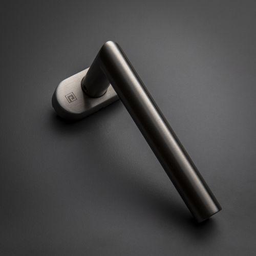Béquille double sur rosace ovale étroite JADE série 1394 - Inox - Droite