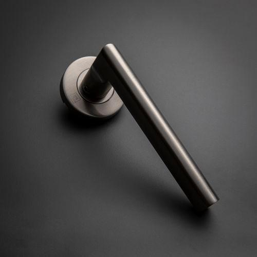Béquille double semi massive sur rosace bec de cane JADE série 1694 - Inox
