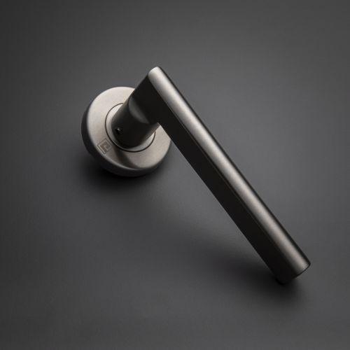 Béquille double massive sur rosace bec de cane JADE série 4001 - Inox